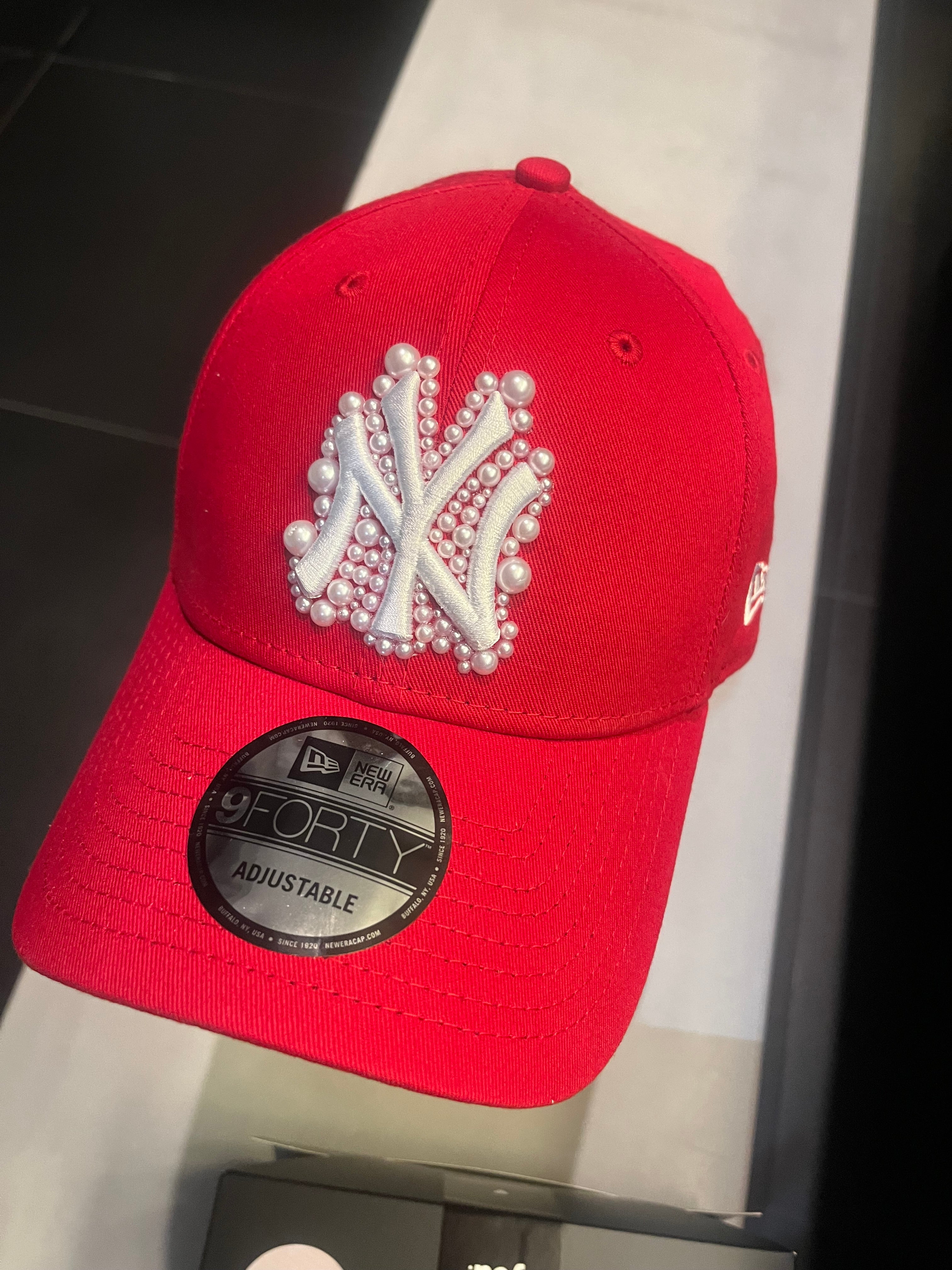 Red pearled New York Yankees cap
