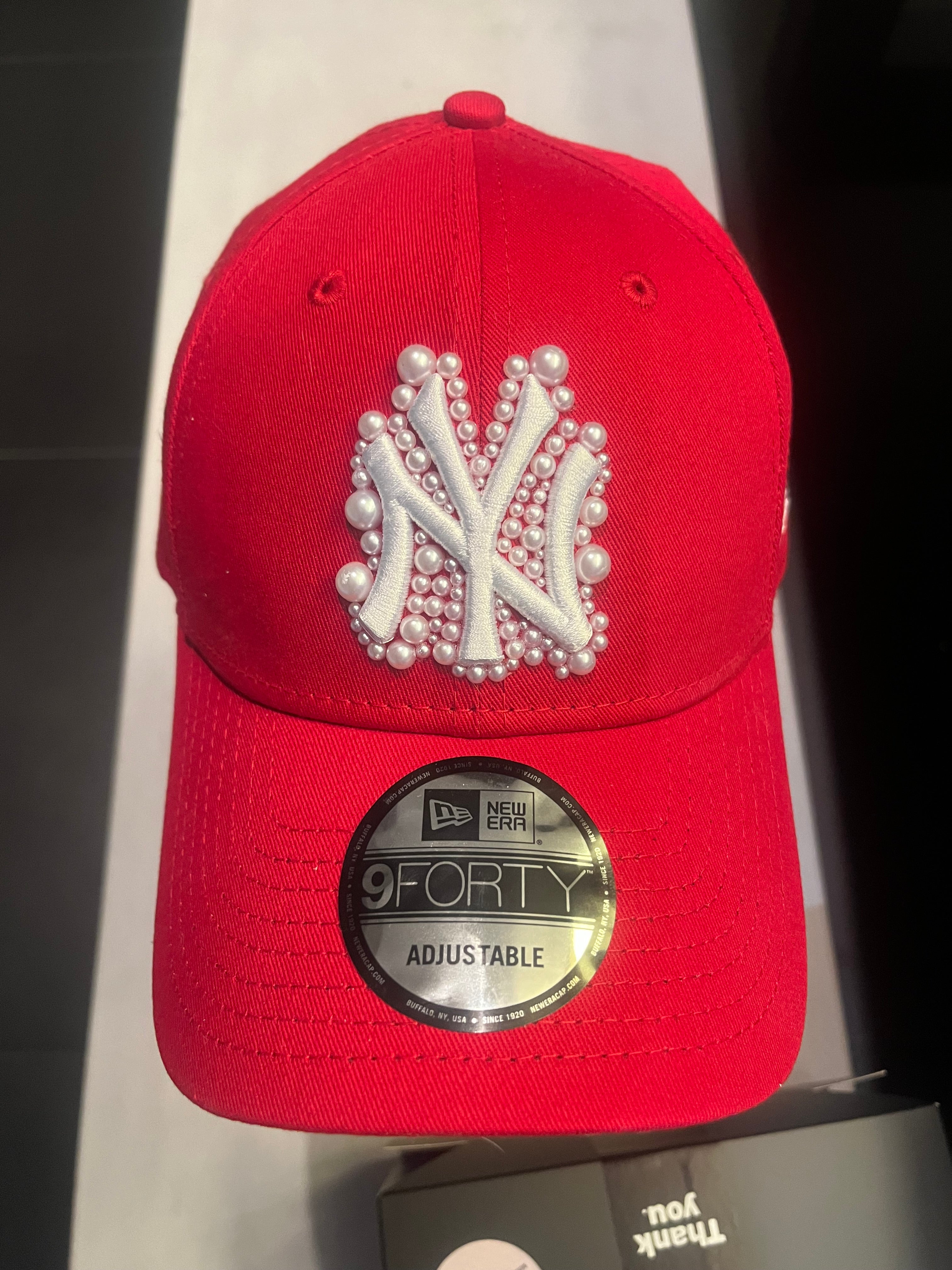 Red pearled New York Yankees cap