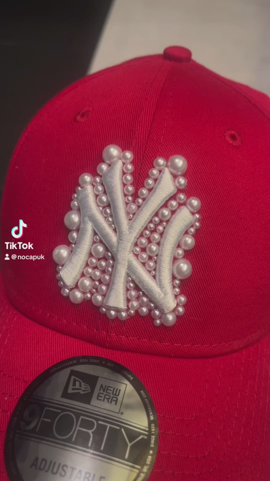 Red pearled New York Yankees cap