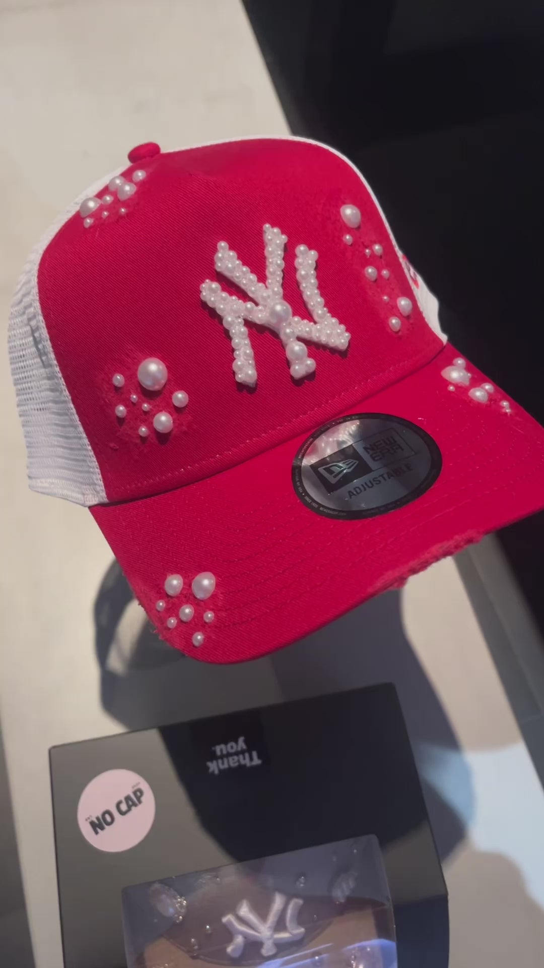 Red & white New York Yankees trucker cap